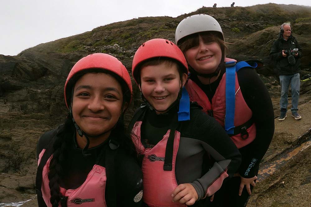 Clore Duffield Coasteering A trio of students on the slipway at Newquay